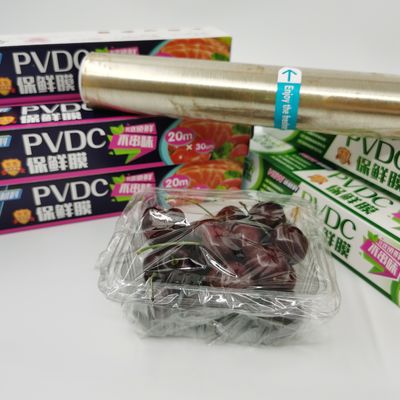 Pembungkus Film Cling PVDC Penghalang Tinggi Mudah Melampirkan Makanan Stretch Wrap Film Roll BPA Free