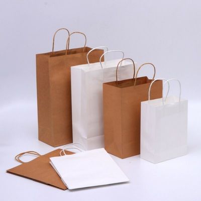 Kantong kertas kraft gravure coklat yang ramah lingkungan dengan logo dicetak 28 * 22cm